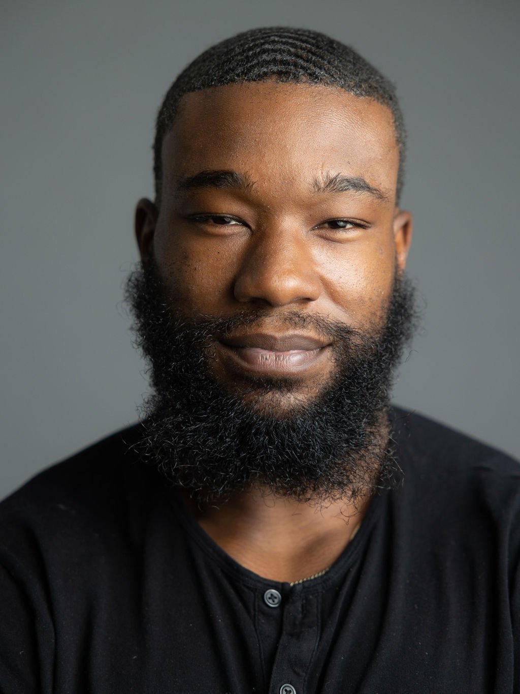 Evan  Holmes headshot